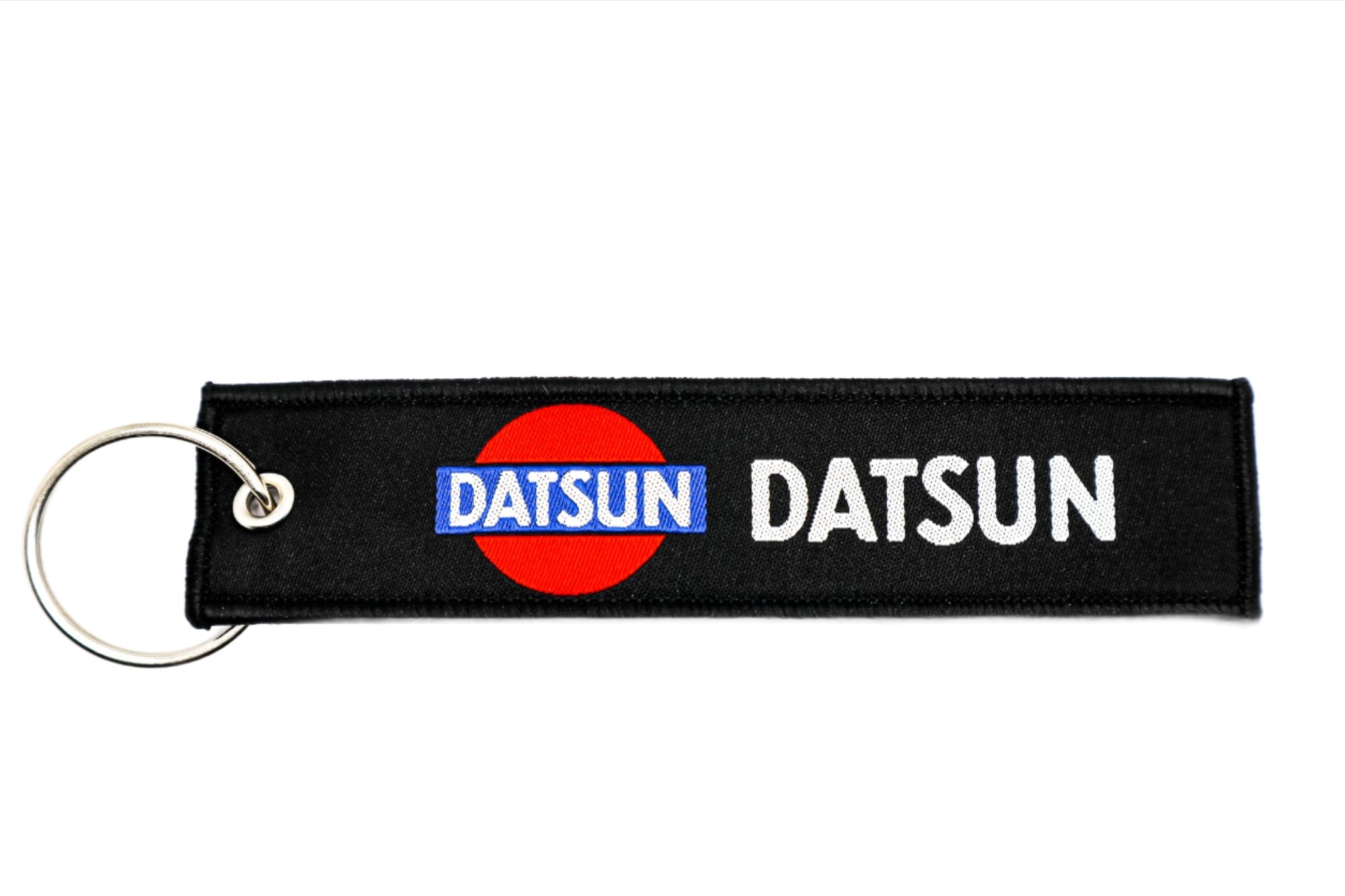 LPK020. VINTAGE DATSUN KEYCHAIN