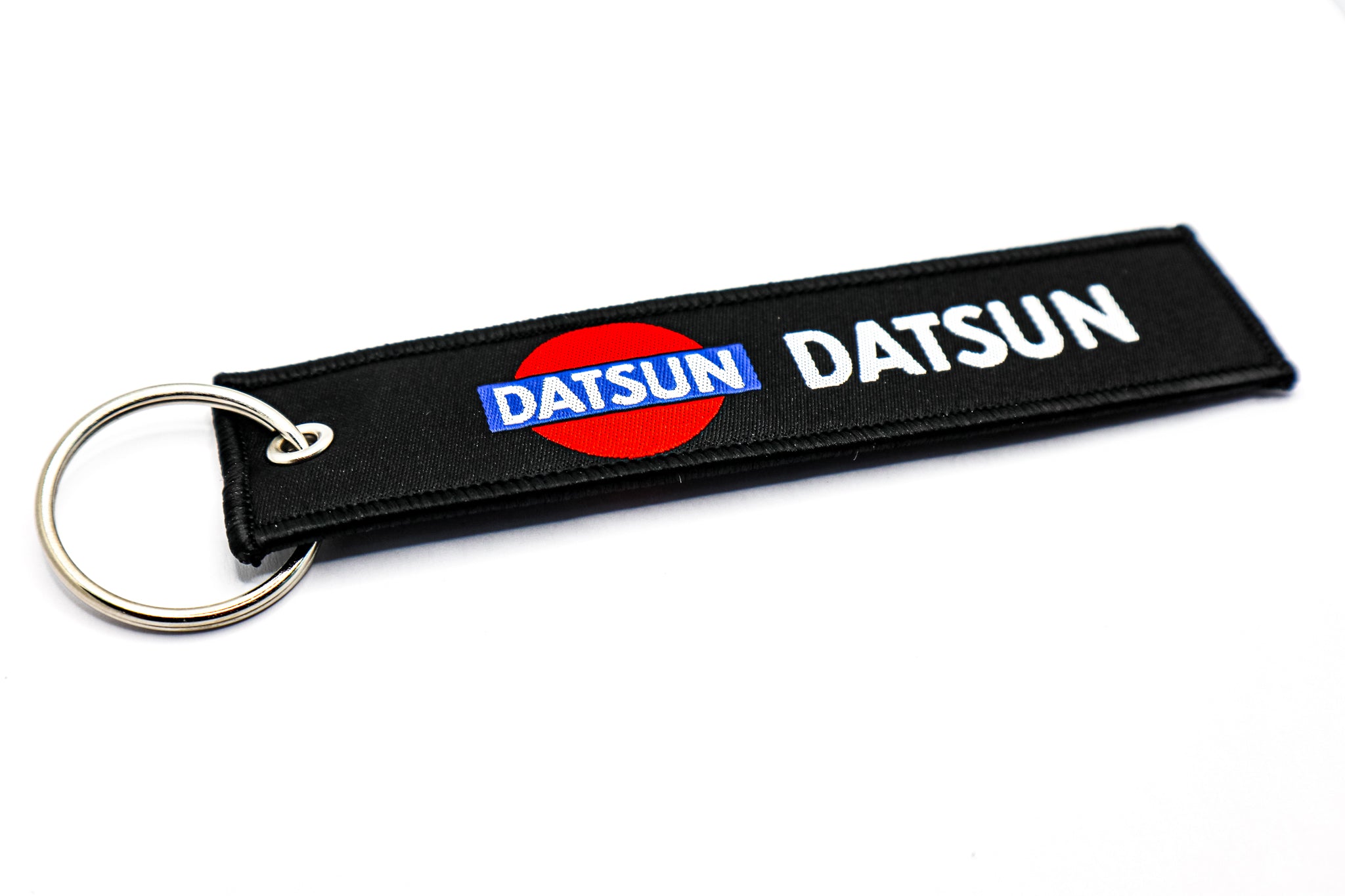 LPK020. VINTAGE DATSUN KEYCHAIN