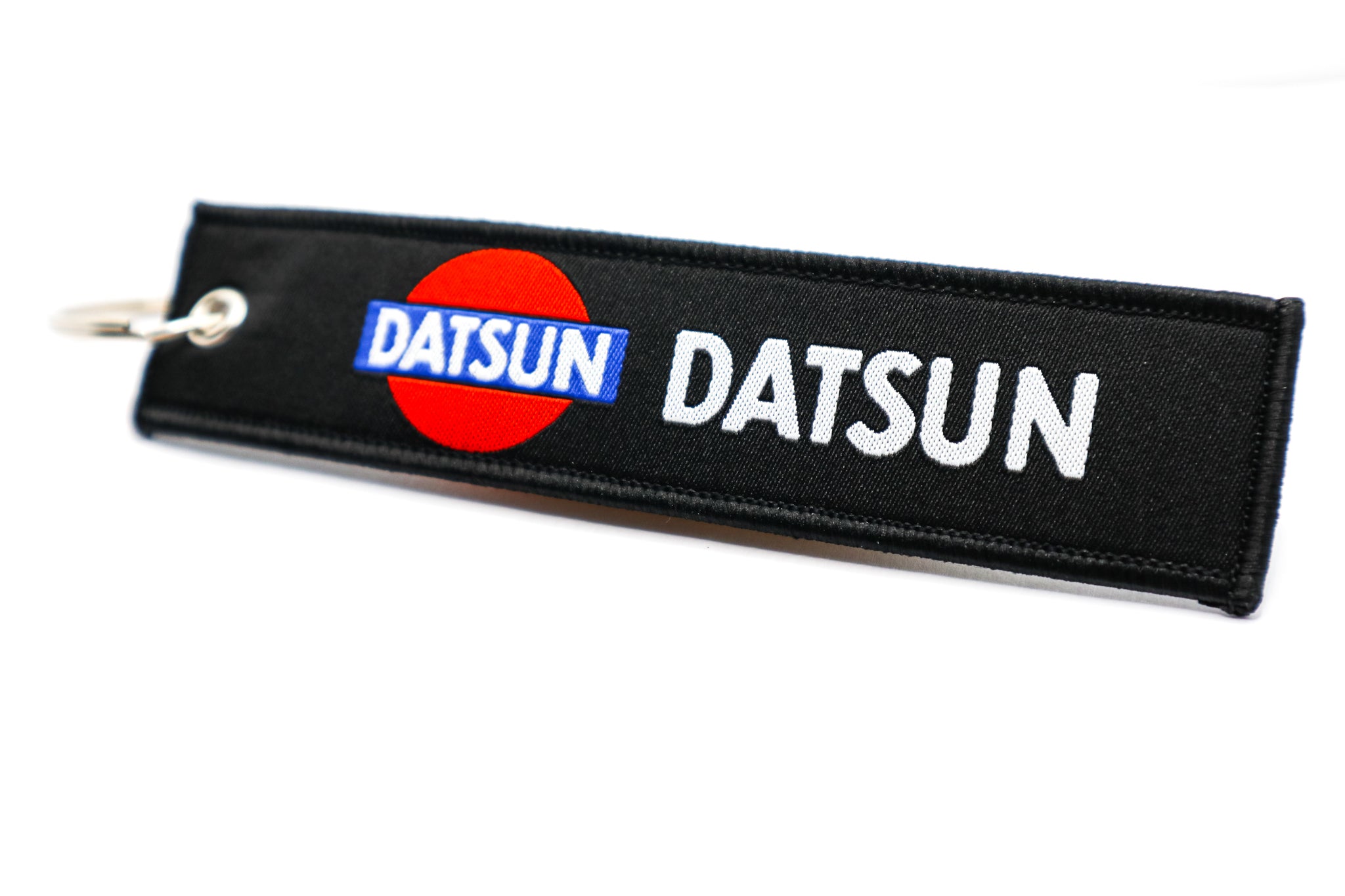 LPK020. VINTAGE DATSUN KEYCHAIN
