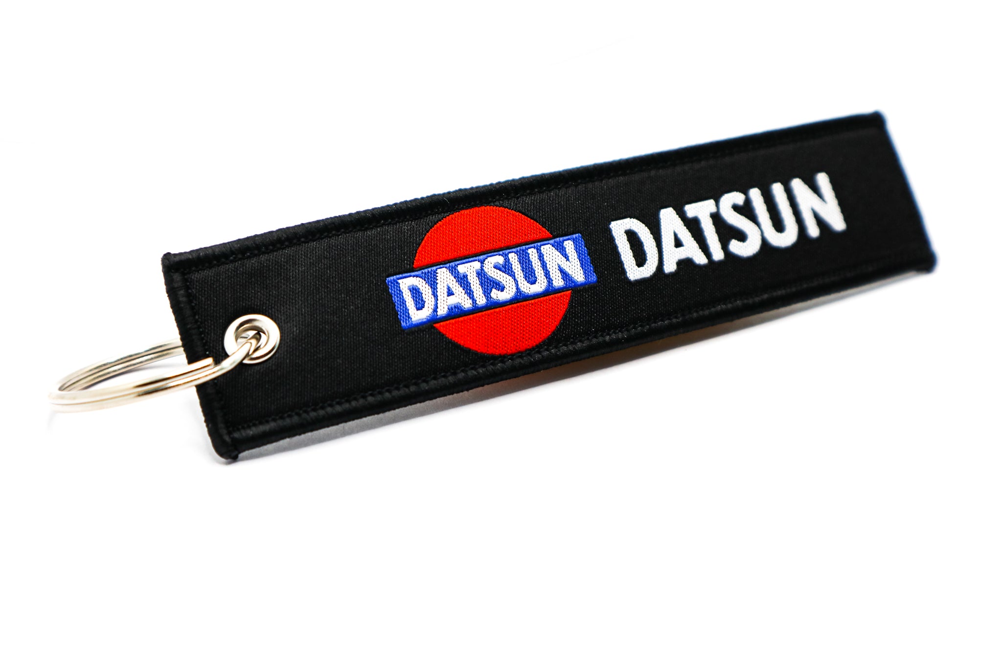 LPK020. VINTAGE DATSUN KEYCHAIN